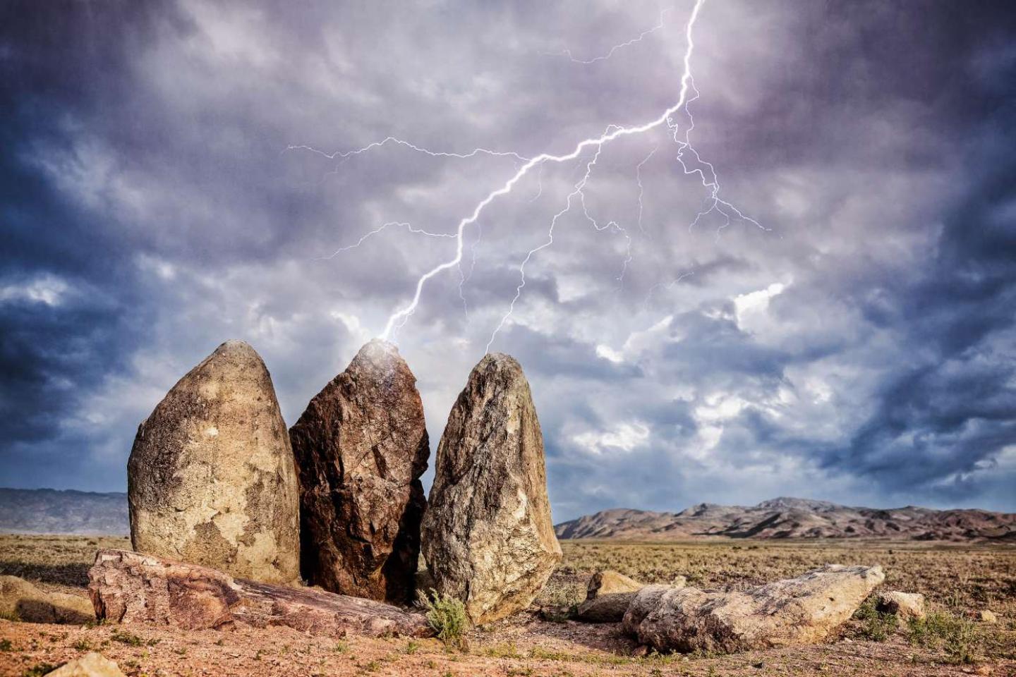 Lightning strikes three big stones in the steppe of Kazakhstan